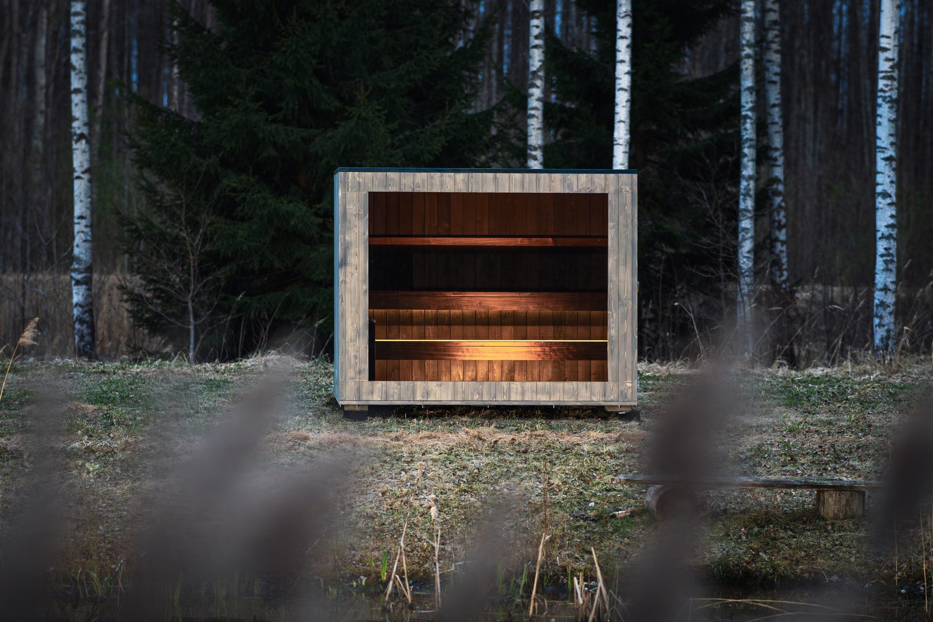 Outdoor sauna cabin installed on a forest plot